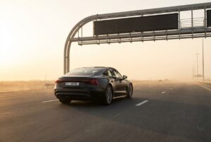 Car approaching an electronic Salik toll gate in Dubai